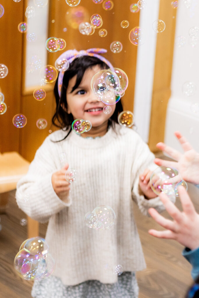 Child with Bubbles at Molly Moocow